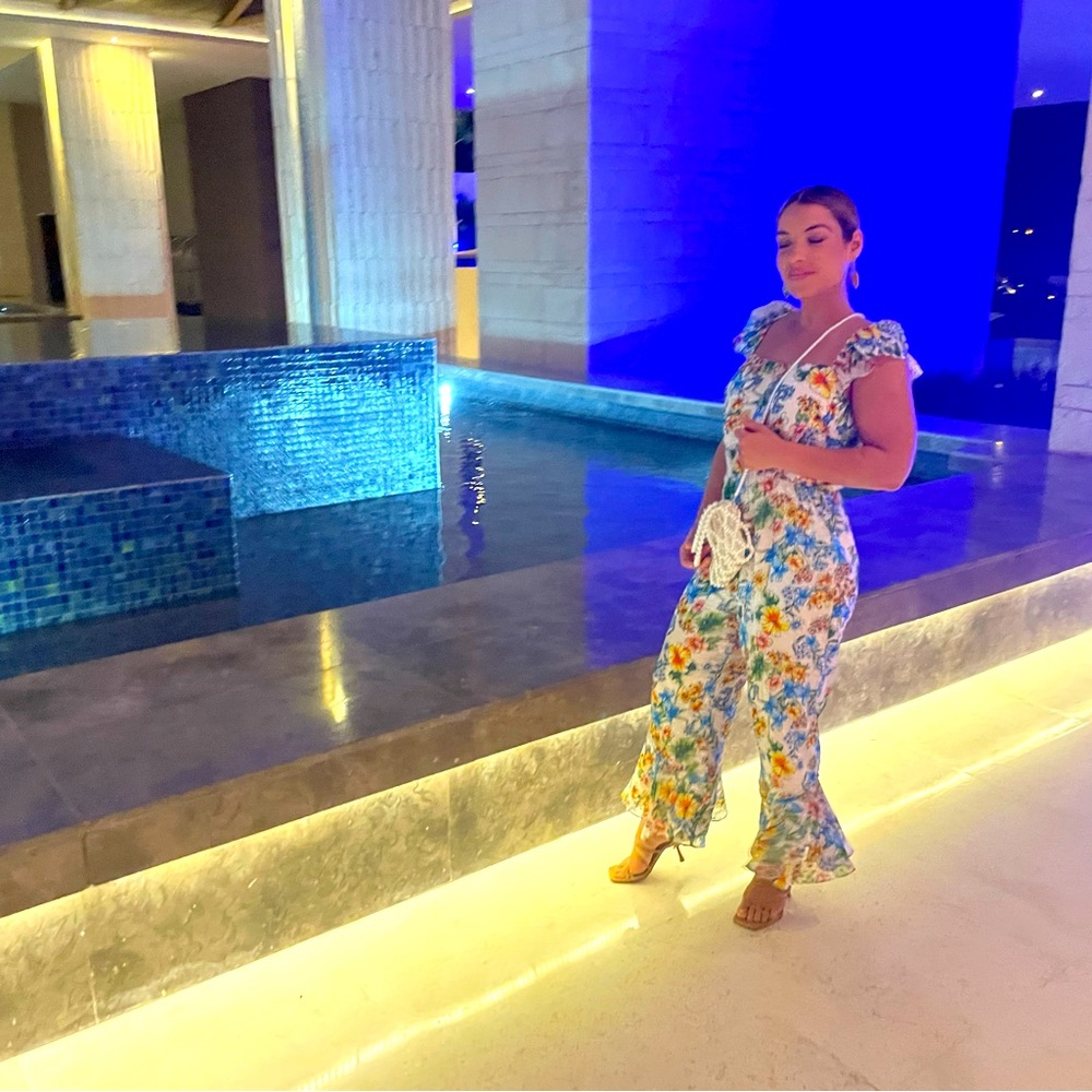 Ali & Jay The Avalon White Floral Print Ruffled Culotte Jumpsuit.